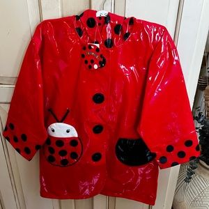 Kidorable Never worn raincoat. Brand new with custom hanger and tags.
